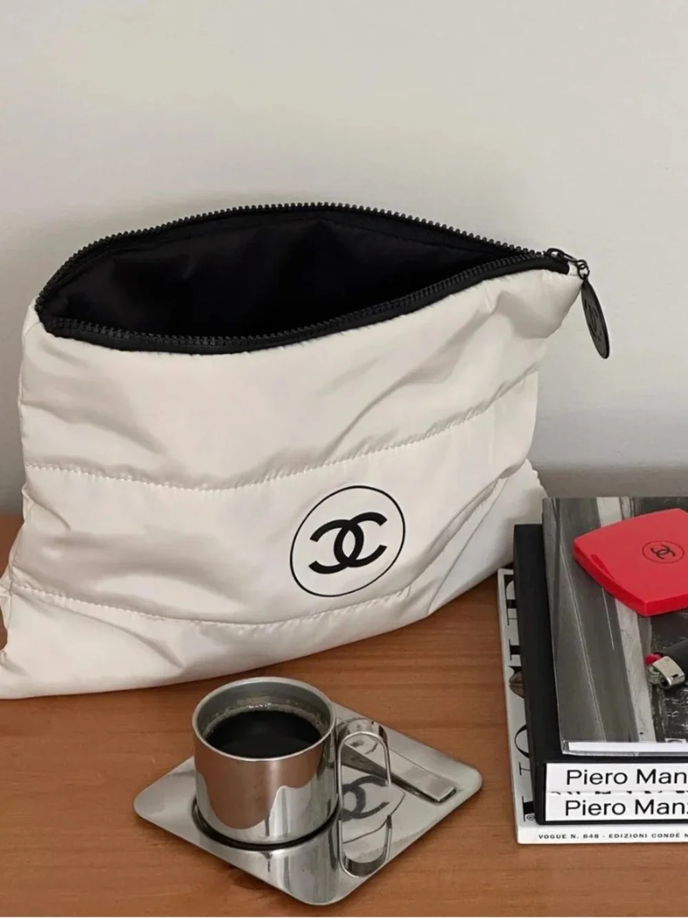 CHANEL White Quilted Cosmetic Pouch with Black Logo